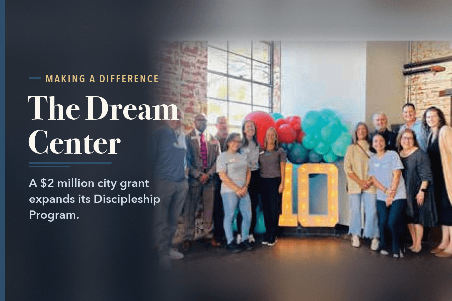 A group of about 16 adults posing with balloons behind a lighted marquee numeral 10 in a brick-walled room, beside the words Charlotte Mecklenburg Dream Center Gets $2M Grant.